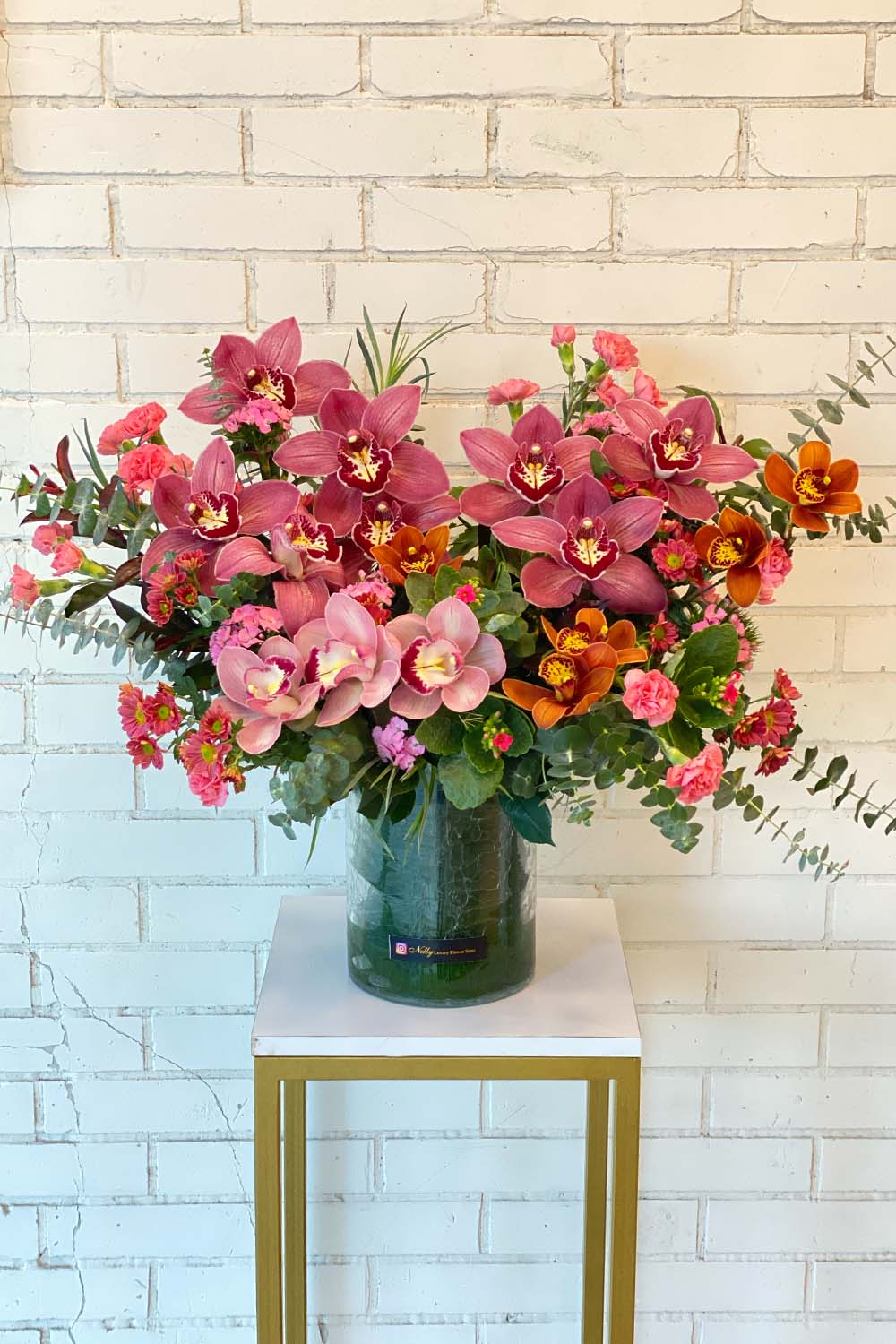 گلدان شیشه‌ای تمام ارکیده سیمبیدیوم (۶۰ سانت) | دیزاین لوکس نلی